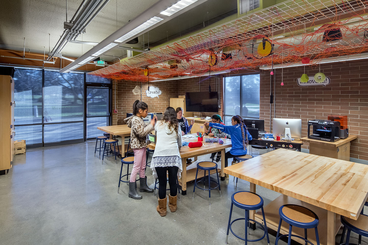 Photo of kids doing crafts at a table